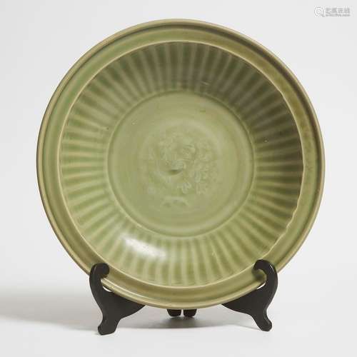 A Longquan Celadon 'Peony' Charger, Ming Dynasty (1368-1644)...