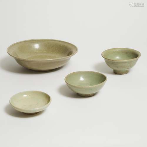 A Group of Four Southeast Asian Celadon-Glazed Bowls and Dis...