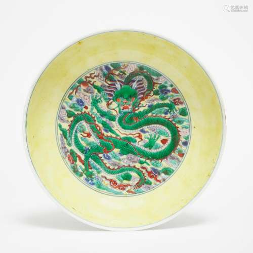 A Rare Yellow-Ground Doucai 'Dragon' Dish, Kangxi Mark and o...