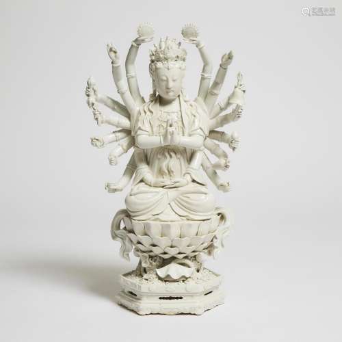 A Large Dehua Blanc de Chine Figure of Thousand-Arm Guanyin,...