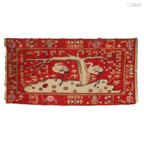 A Chinese Red-Ground 'Crane' Rug, Late 19th/Early 20th Centu...