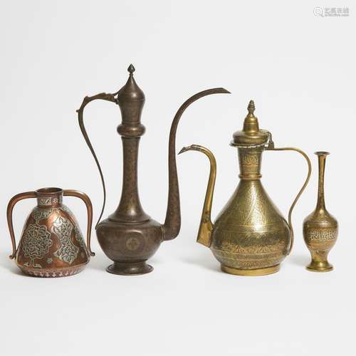 A Group of Four Syrian Silver and Indian Ewers, Early 20th C...