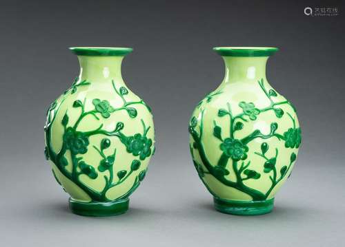 A PAIR OF GREEN OVERLAY PEKING GLASS ’PRUNUS’ VASES, GUANGXU...