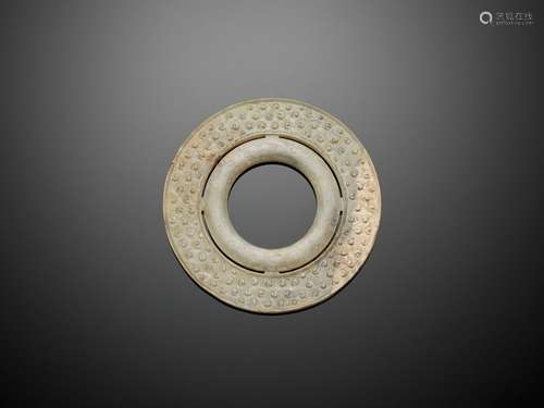 A JADE DOUBLE DISK, BI, WARRING STATES TO WESTERN HAN DYNAST...