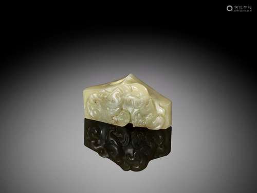 A CELADON JADE SWORD GUARD, WESTERN HAN DYNASTY