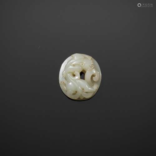 AN EXQUISITE SMALL PALE CELADON JADE SWORD POMMEL WITH HORNL...
