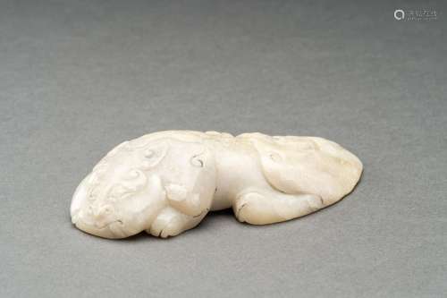 A JADE CARVING OF A BIXIE, c. 1920s