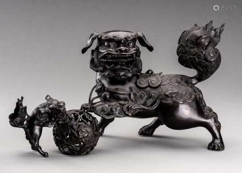 A LARGE BRONZE FIGURE OF A BUDDHIST LION WITH CUB, QING