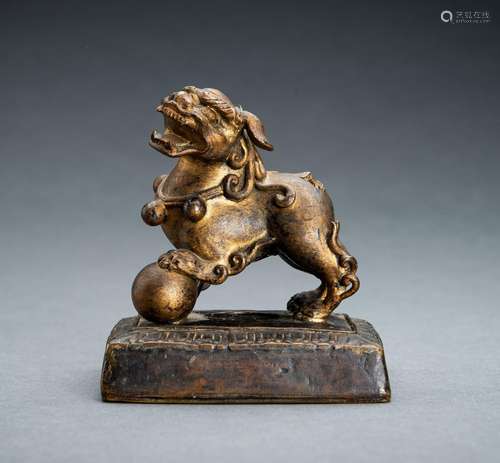 A GILT-BRONZE ‘BUDDHIST LION’ SEAL, c. 1920s