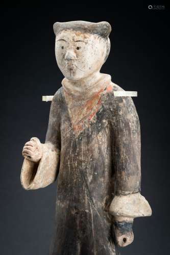 A POTTERY FIGURE OF A WARRIOR, HAN DYNASTY