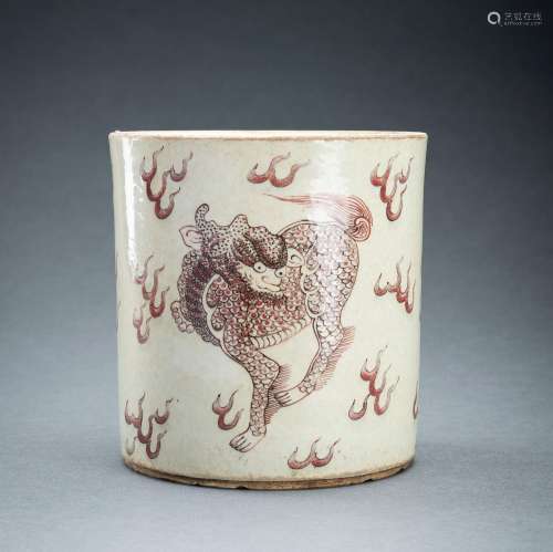 AN IRON-RED ‘QILIN’ PORCELAIN BRUSHPOT, BITONG, 17th CENTURY