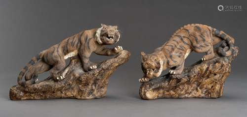 A PAIR OF SHIWAN PORCELAIN TIGERS