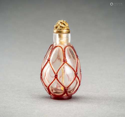 A RED OVERLAY GLASS SNUFF BOTTLE, QING DYNASTY