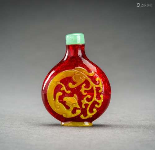 A YELLOW OVERLAY RED ‘CHILONG’ GLASS SNUFF BOTTLE, QING DYNA...