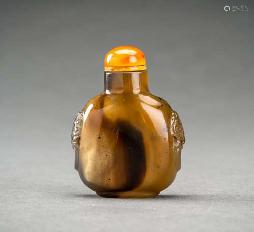 A GLASS IN IMITATION OF SHADOW AGATE SNUFF BOTTLE, QING DYNA...