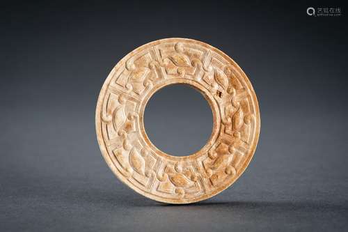 A SMALL OCHRE JADE ARCHAISTIC BI DISC, QING