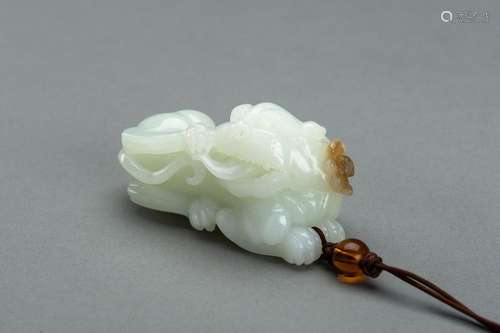 A WHITE JADE ‘BUDDHIST LION AND BAT’ CARVING, 1900s