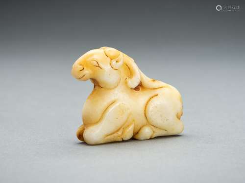 A JADE CARVING OF A RECUMBENT DEER, c. 1900s