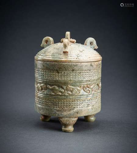 AN ARCHAISTIC GREEN JADE TRIPOD VESSEL