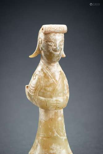 AN ARCHAISTIC CELADON JADE FIGURE OF A STANDING LADY