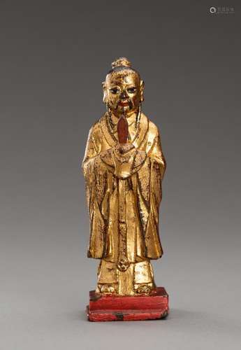 A GOLD LACQUERED BRONZE FIGURE OF AN OFFICIAL