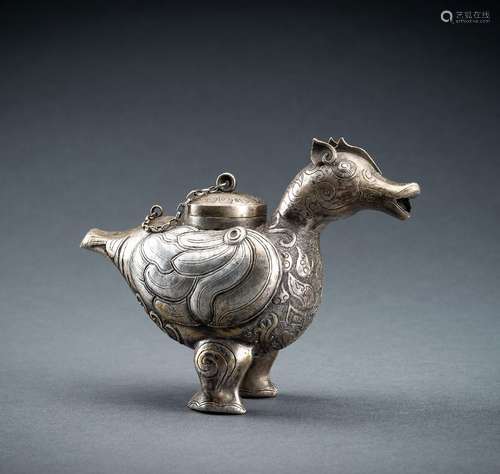 A FINE ARCHAISTIC SILVER REPOUSSÉ VESSEL OF A MYTHICAL BIRD,...