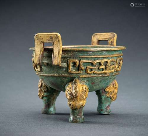 AN ARCHAISTIC FIRE-GILT COPPER REPOUSSÉ TRIPOD CENSER