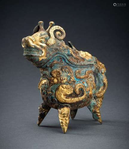 AN ARCHAISTIC FIRE-GILT COPPER REPOUSSÉ POURING VESSEL OF A ...