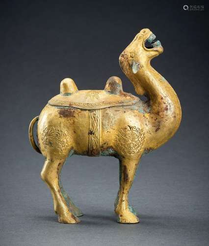 AN ARCHAISTIC FIRE-GILT COPPER REPOUSSÉ FIGURE OF A BACTRIAN...