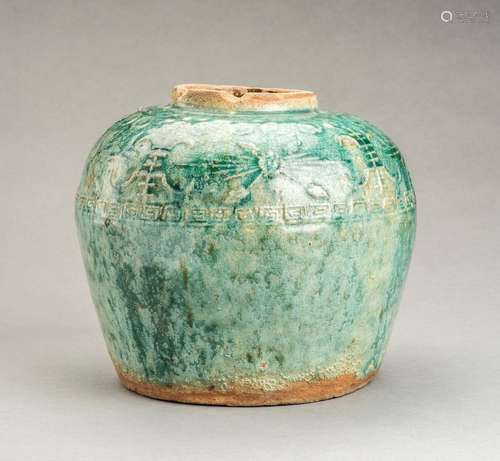 A GREEN GLAZED MING DYNASTY POTTERY VASE