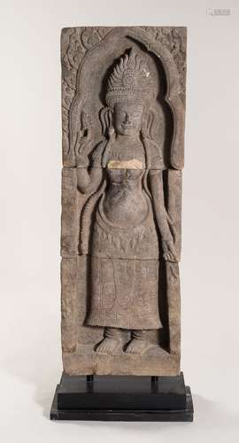 A VERY LARGE KHMER-STYLE SANDSTONE FIGURE OF AN APSARA, c. 1...