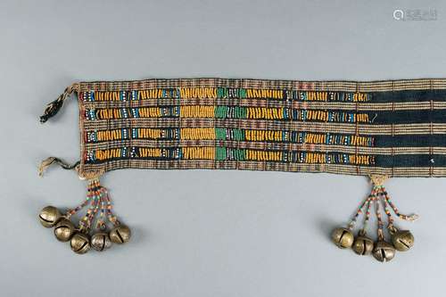 A NAGALAND BEADED SASH WITH BRASS BELLS, c. 1900s