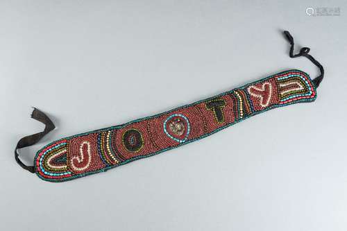 A BEADED BELT WITH INITIALS ‘JOTY’, INDIA