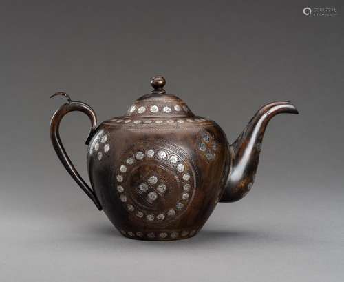 A SILVER AND COPPER TEAPOT, 1900s