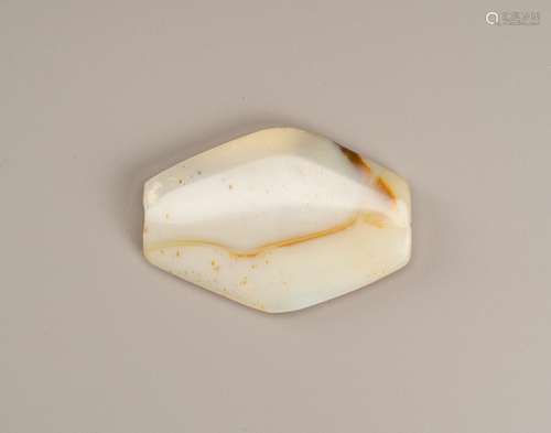 A RHOMBOID SHAPED INDUS VALLEY AGATE BEAD