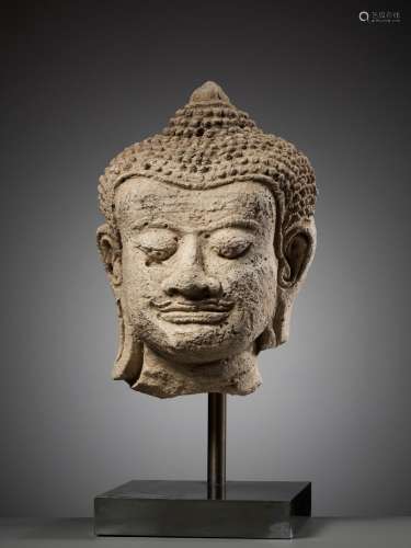 A HARIPUNJAYA STUCCO HEAD OF BUDDHA, THAILAND, 11TH-13TH CEN...