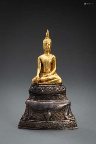 A THAI GOLD AND SILVER FOIL FIGURE OF BUDDHA SHAKYAMUNI, 19t...
