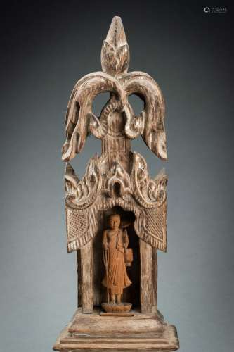 A TEAKWOOD SHRINE WITH A MONK, 19th CENTURY