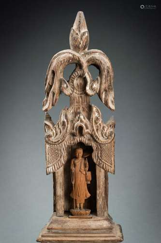 A TEAKWOOD SHRINE WITH A MONK, 19th CENTURY