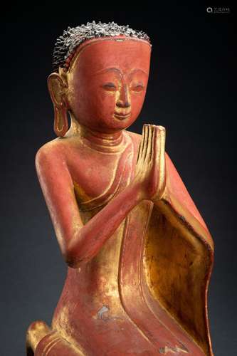 A BURMESE LACQUERED PAPER MACHE FIGURE OF A MONK, 18th – 19t...