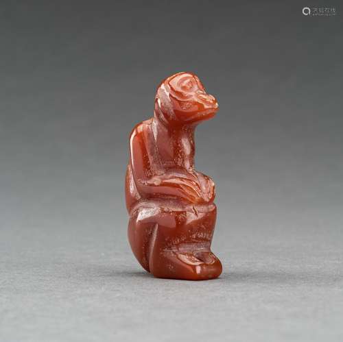 A PYU CARNELIAN AGATE ‘MONKEY’ TALISMAN