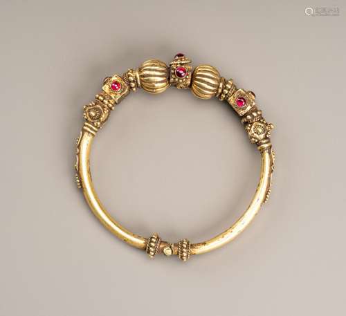 A BURMESE GOLD BRACELET SET WITH RUBIES