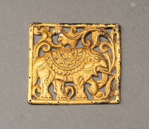 A SOUTHEAST ASIAN GOLD REPOUSSÉ PLAQUE WITH AN ELEPHANT