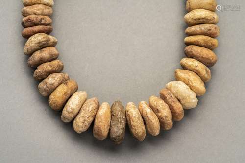 A NECKLACE WITH GRADUATED NEOLITHIC BEADS