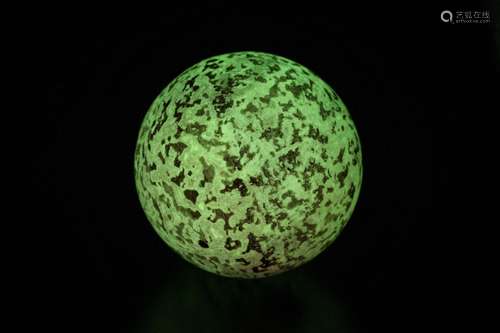 A ‘GLOWING IN THE DARK’ STONE SPHERE