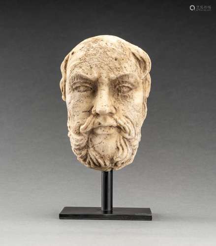 A GANDHARAN WHITE MARBLE HEAD OF A BEARDED MAN