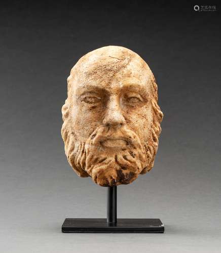 A GANDHARAN WHITE MARBLE HEAD OF A BEARDED MAN