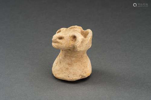 A BACTRIAN BONE CARVING OF AN ANIMAL HEAD