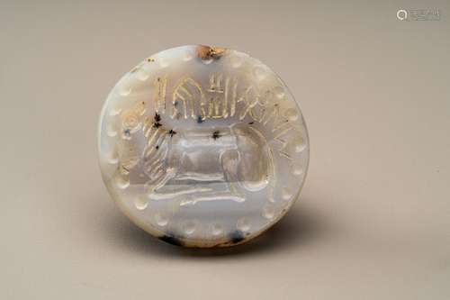 A BACTRIAN AGATE INTAGLIO SEAL DEPICTING A COW