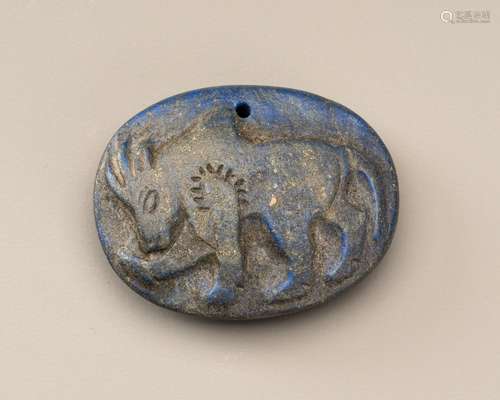 A BACTRIAN INTAGLIO LAPIS LAZULI TALISMAN OF A BULL